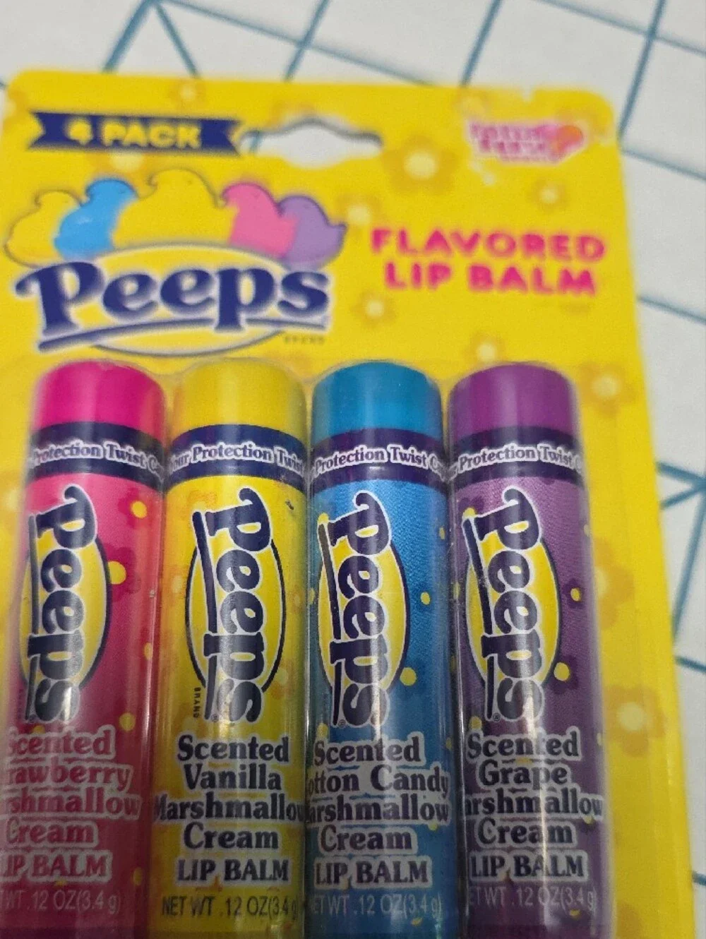Peeps Kids Flavored Lip Balm 4-Pack - Pink, Yellow, Blue, Purple